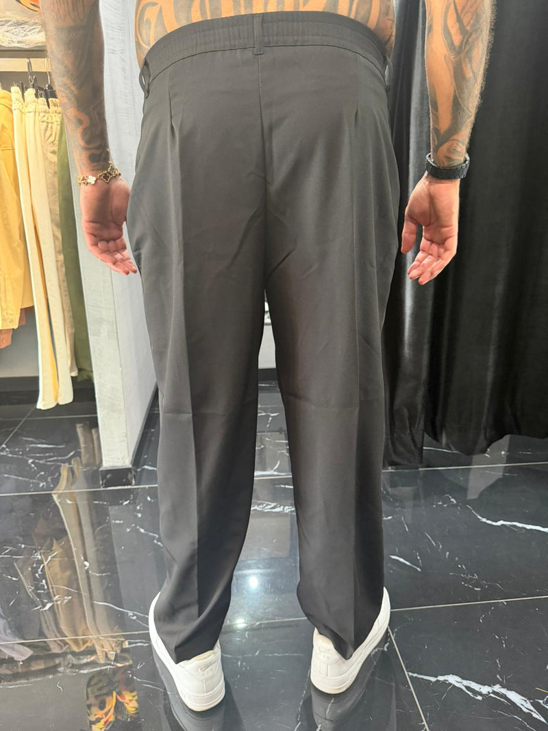 Pantalone elegante con bottone