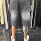Jeans nero baggy con strappi