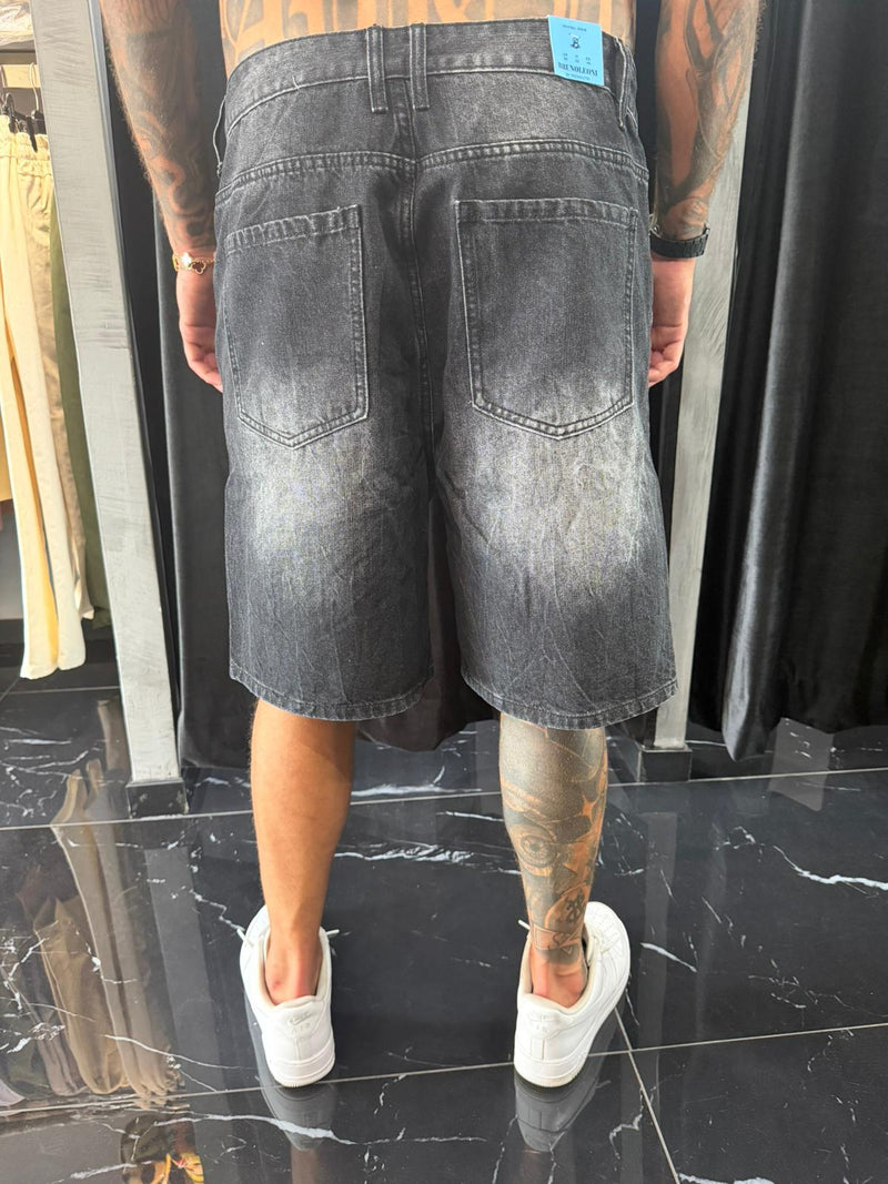 Jeans nero baggy con strappi