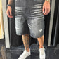 Jeans nero baggy con strappi