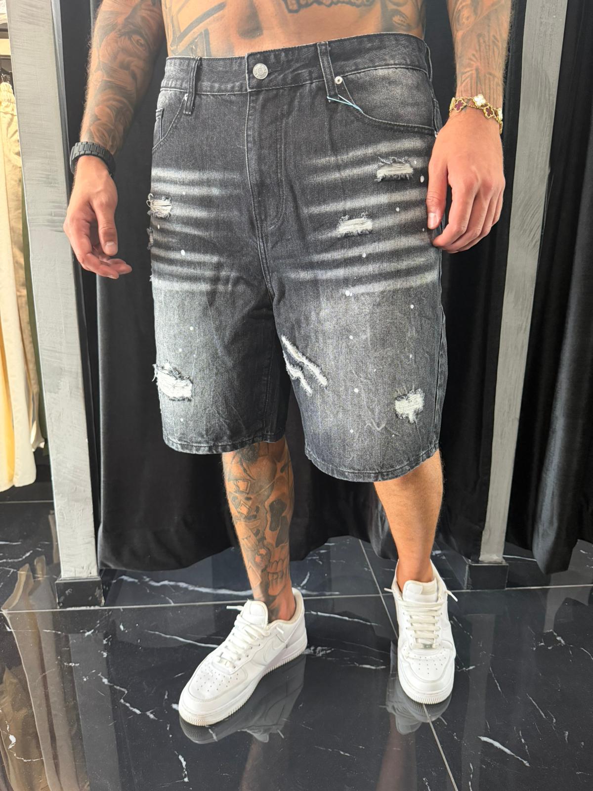 Jeans nero baggy con strappi