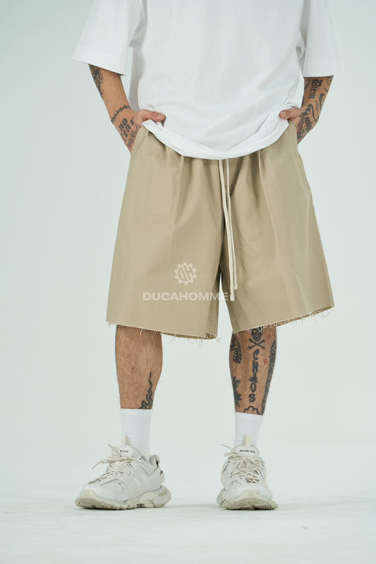 Pantaloncino cotone rigido taglio vivo Oversize