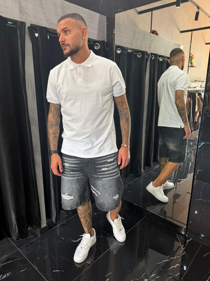 Jeans nero baggy con strappi