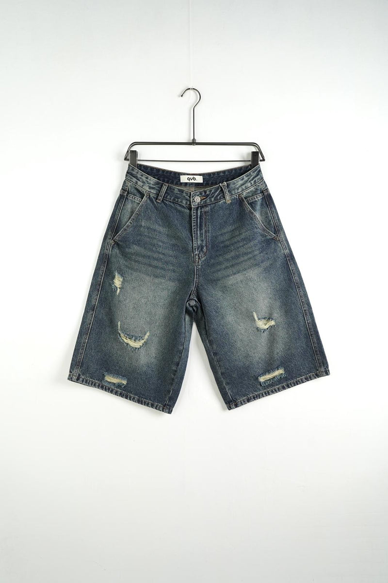 Jeans blu strappi